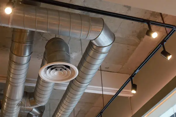 Commercial ventilation ductwork representing Lotte Chemical UK case study